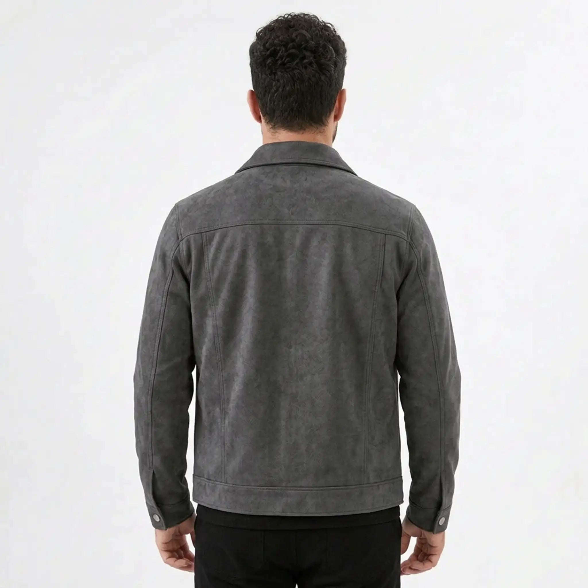 Back view of a man wearing a gray suede-look trucker jacket