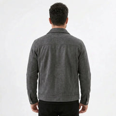 Back view of a man wearing a gray suede-look trucker jacket