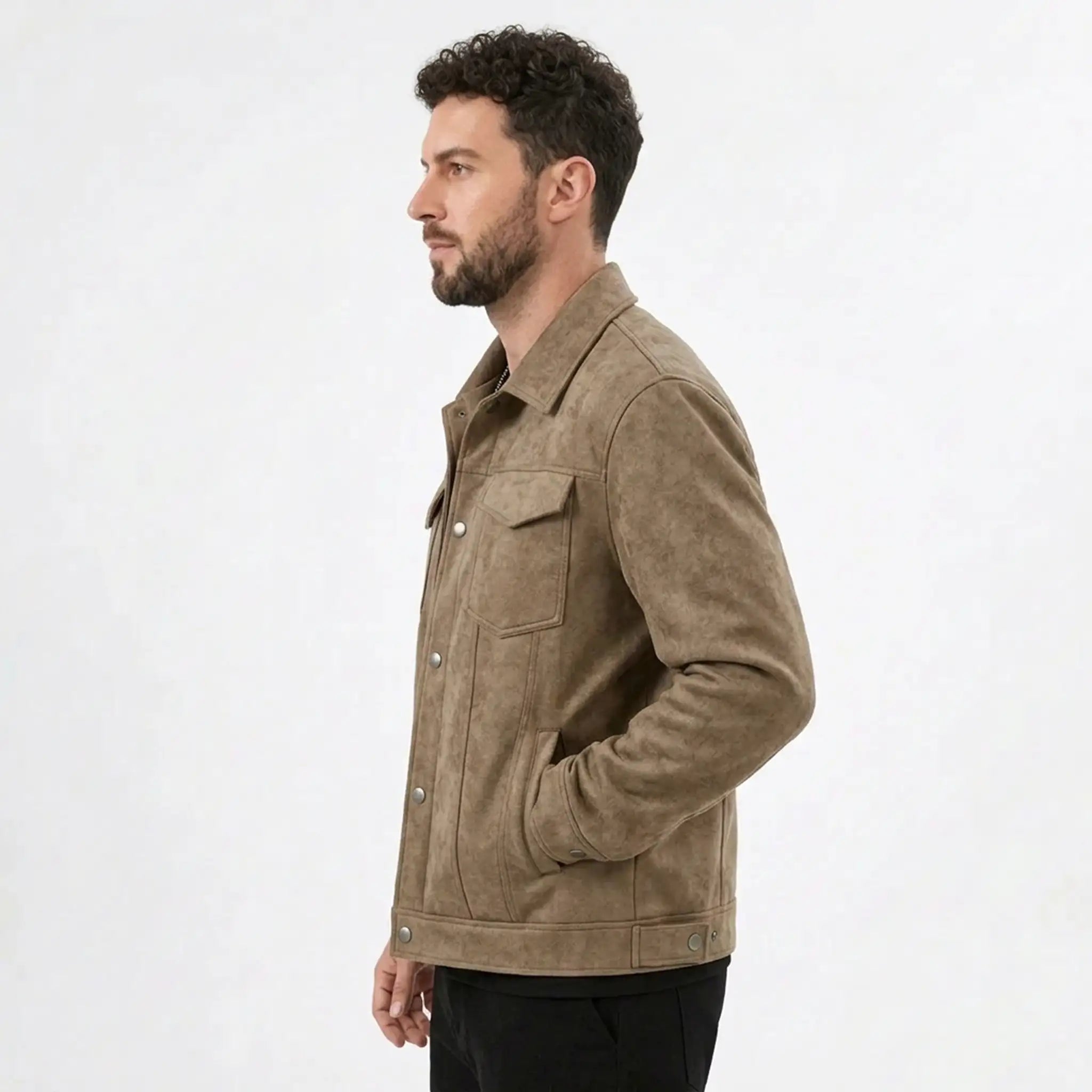 Man in a khaki suede-look trucker jacket, side profile view