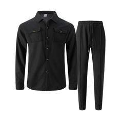 Black waffle knit shirt jacket and drawstring trousers flat lay, front