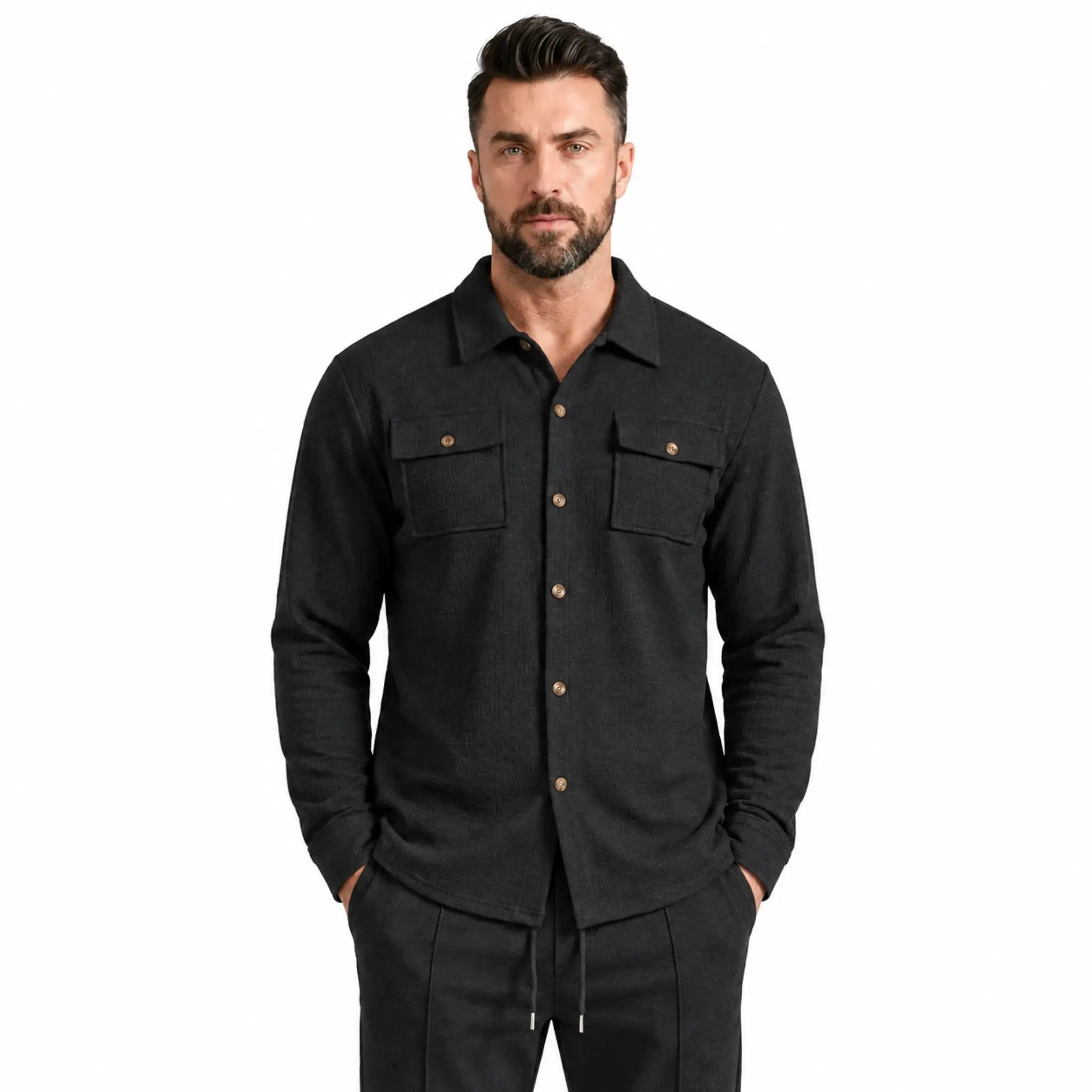 Black waffle knit shirt jacket with chest flap pockets, front close-up