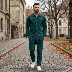 Dark green waffle knit set worn walking a cobblestone street in autumn