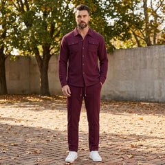 Wine red waffle knit set worn outdoors in an autumn park