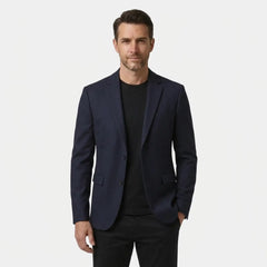 Men's navy wool blend blazer, two-button slim fit, front view over black tee