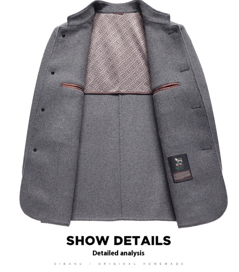 MannerCo men's gray wool overcoat interior showing patterned lining and brand label detail