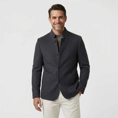 MannerCo men's gray double-faced wool overcoat with stand collar styled with cream trousers