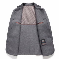 MannerCo men's gray double-faced wool overcoat open front showing patterned interior lining display