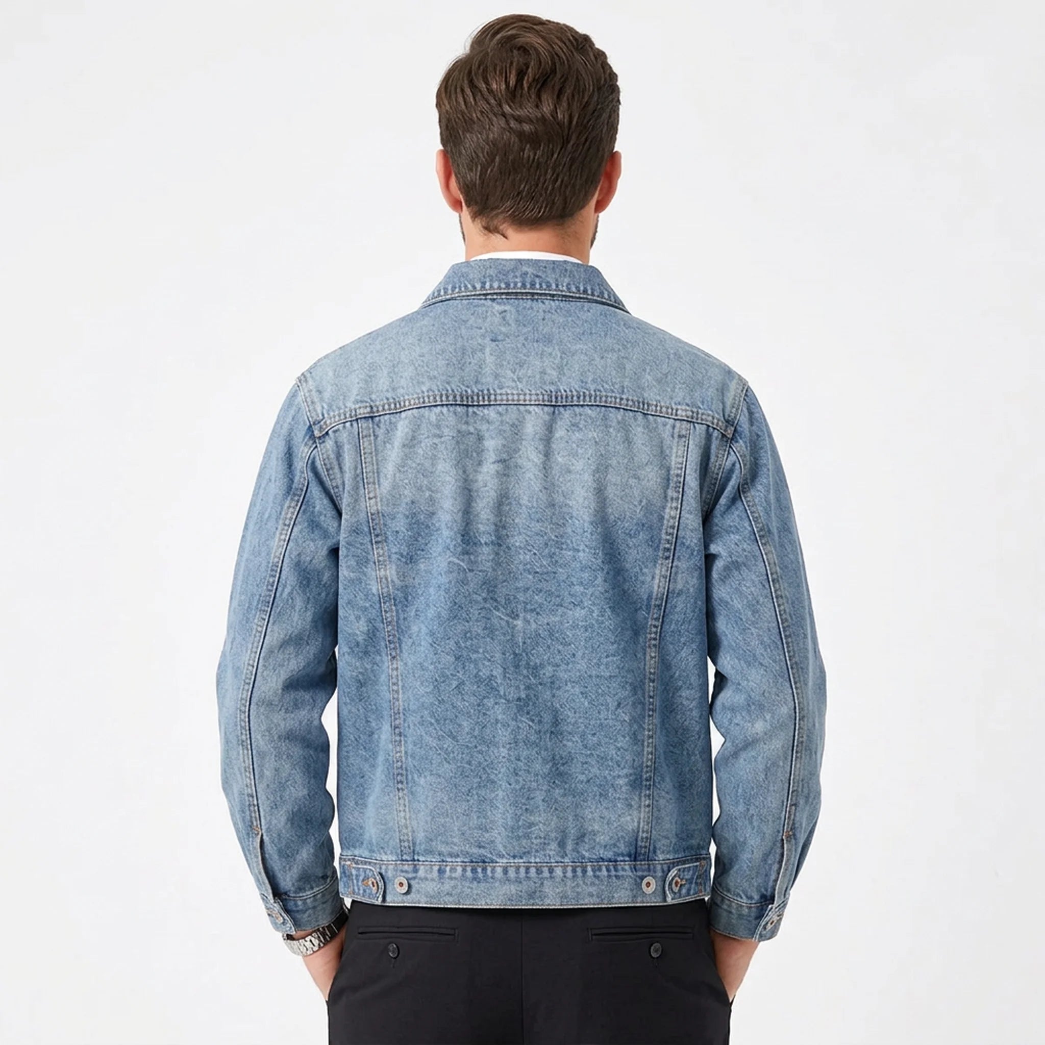 Mid blue workwear denim jacket on model, back view