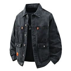 Washed black workwear denim jacket with utility pockets, front view