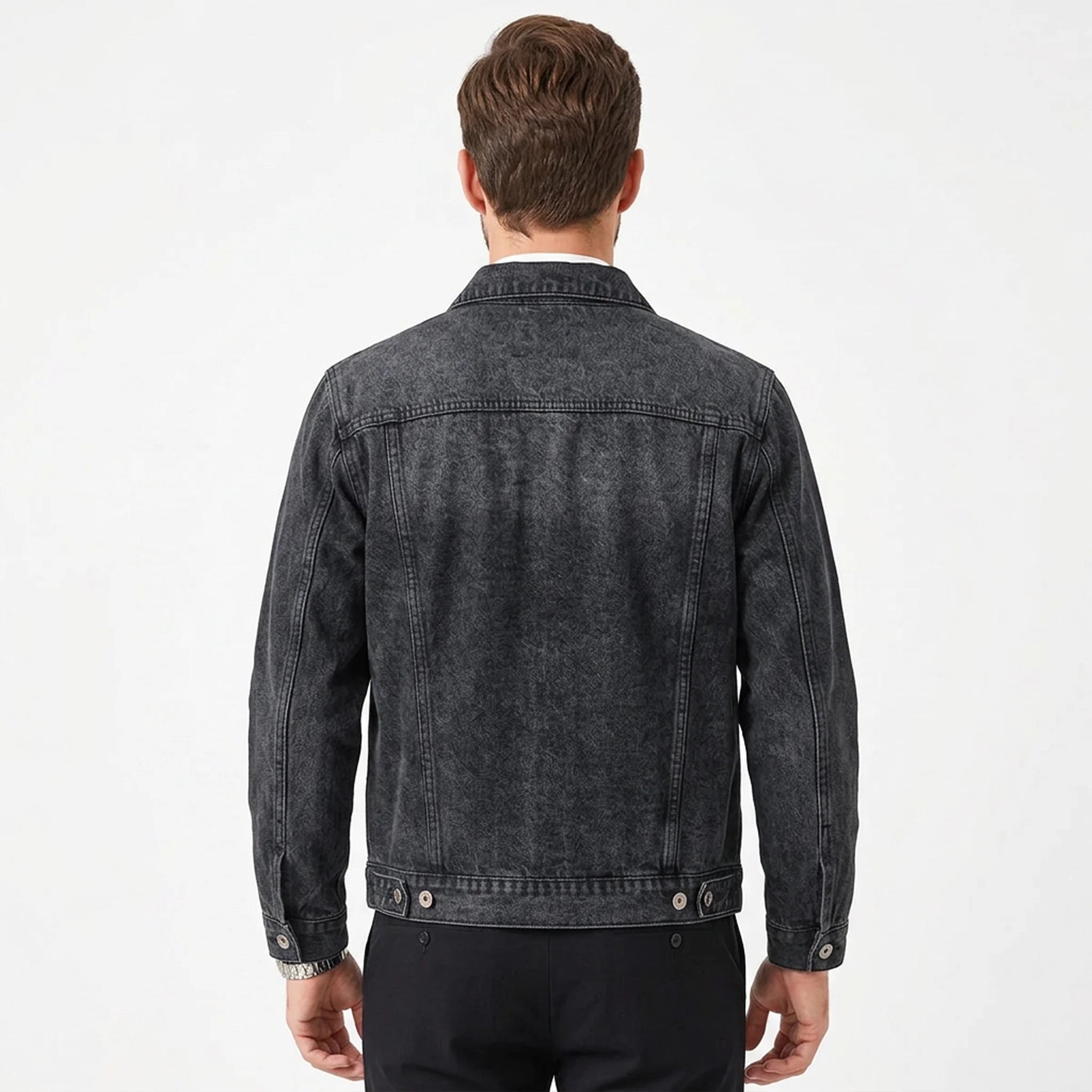 Washed black workwear denim jacket on model, back view