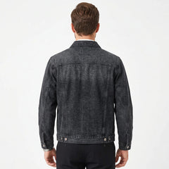 Washed black workwear denim jacket on model, back view