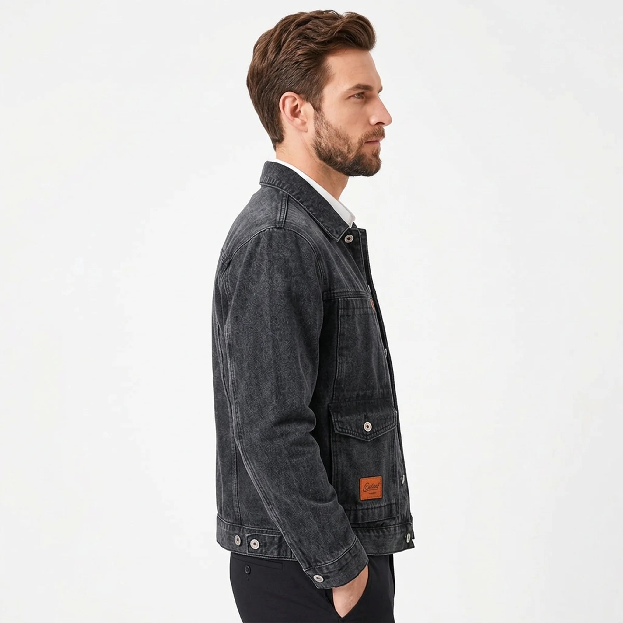 Washed black workwear denim jacket on model, side view