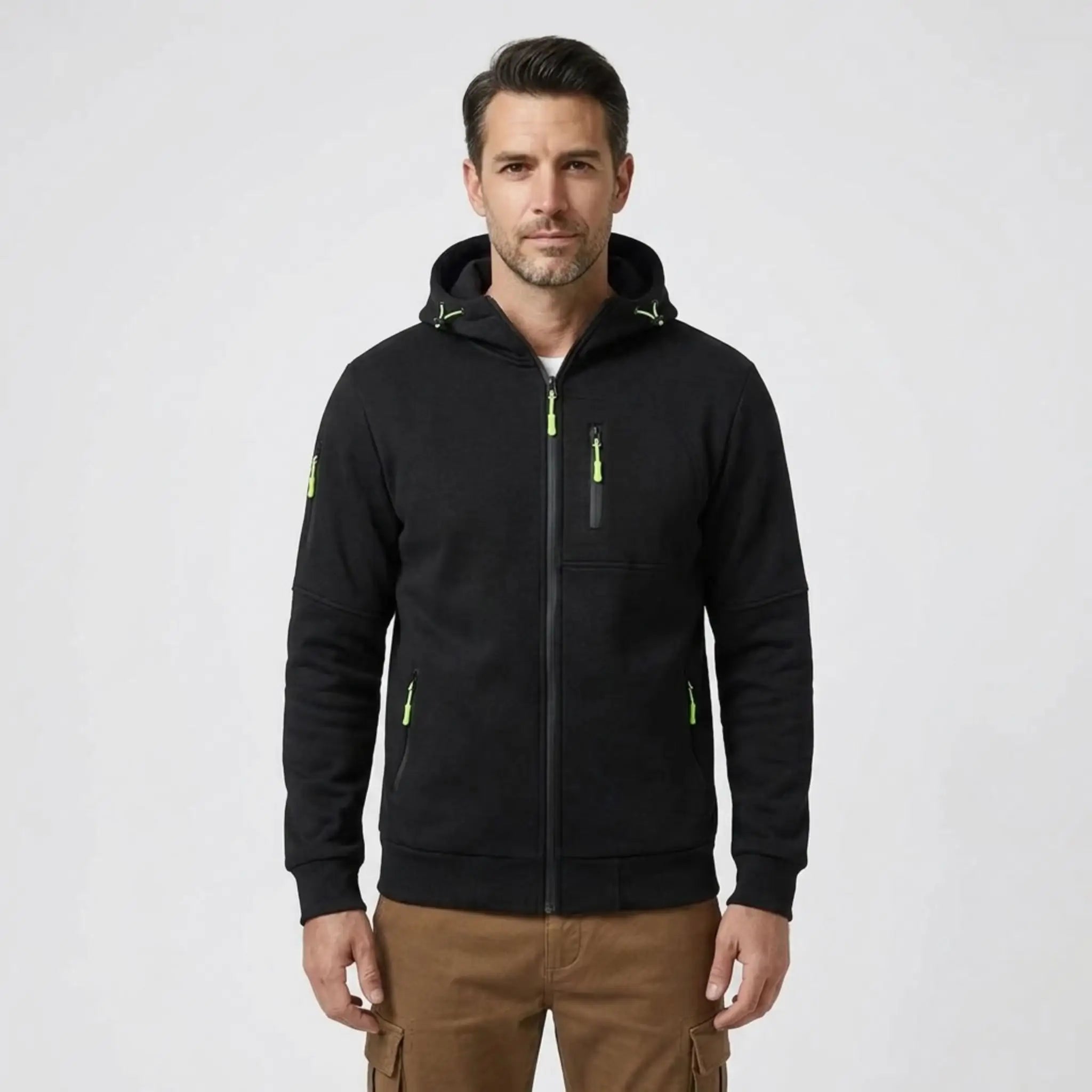 MannerCo men's black zip-up fleece hoodie, front view with brown chinos
