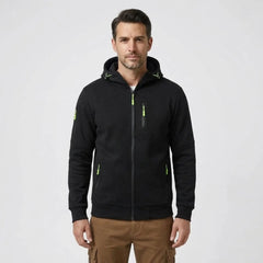MannerCo men's black zip-up fleece hoodie, front view with brown chinos