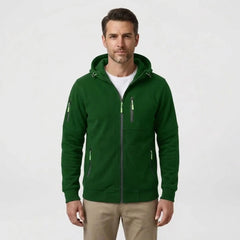 MannerCo men's green zip-up fleece hoodie, front view with beige chinos