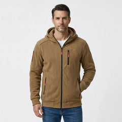 MannerCo men's khaki zip-up fleece hoodie, front view with jeans