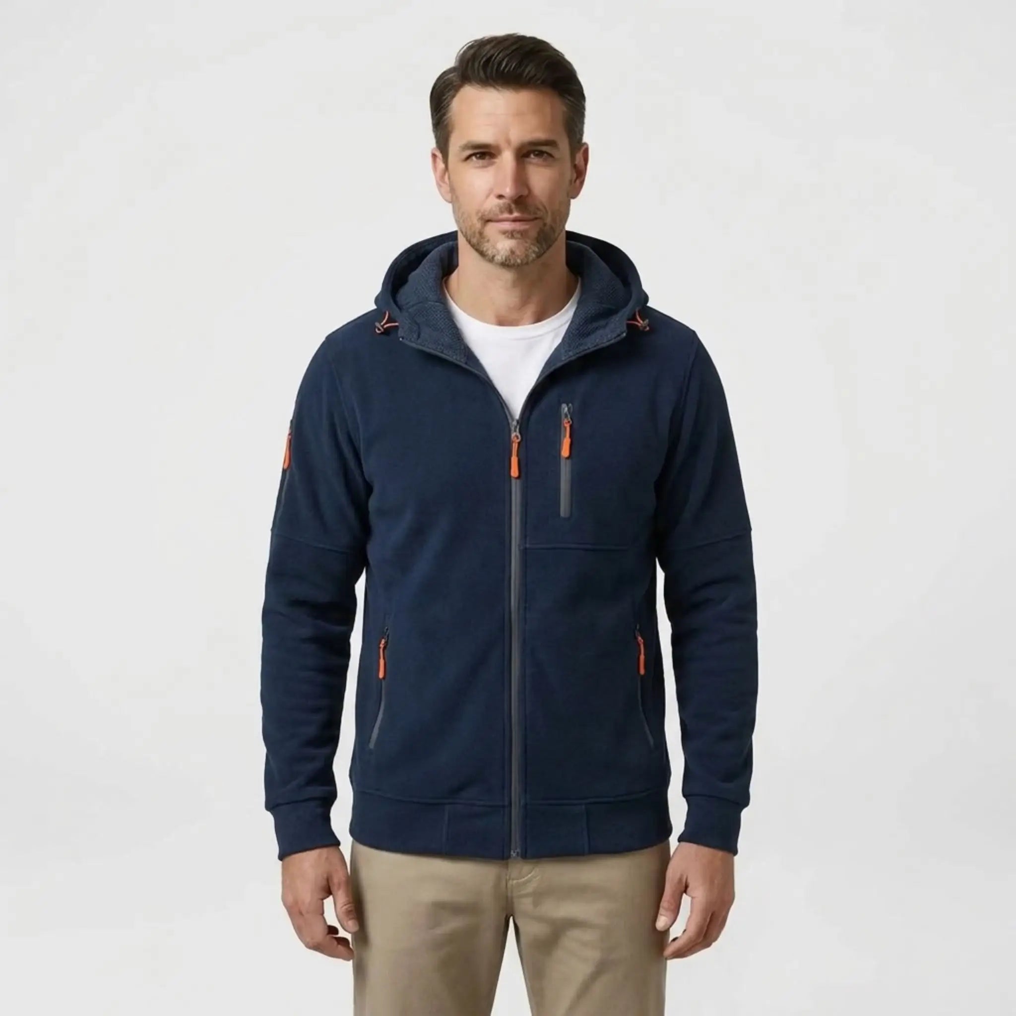 MannerCo men's navy blue zip-up fleece hoodie, front view with beige chinos