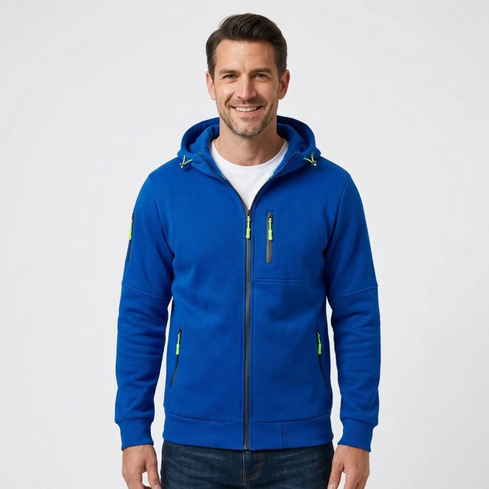 MannerCo men's royal blue zip-up fleece hoodie, front view with jeans