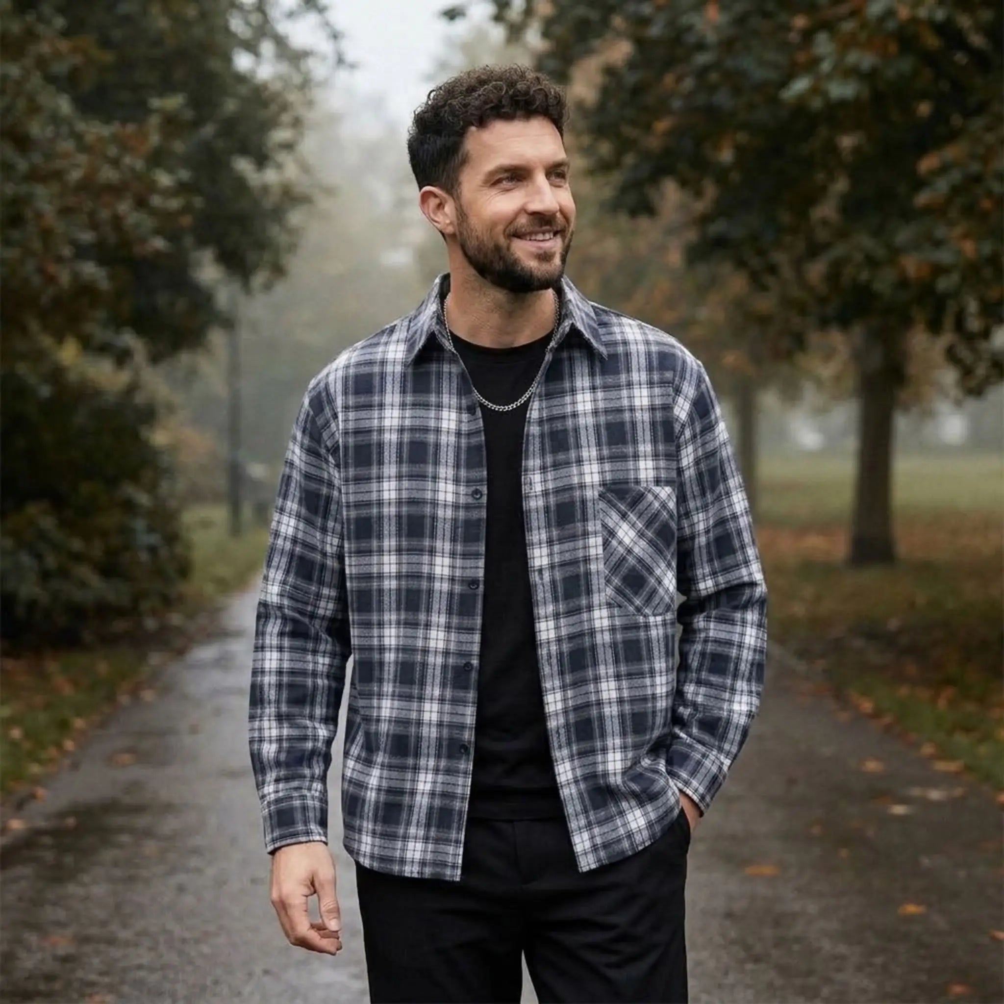 MannerCo navy blue plaid flannel shirt worn outdoors relaxed fit over black tee