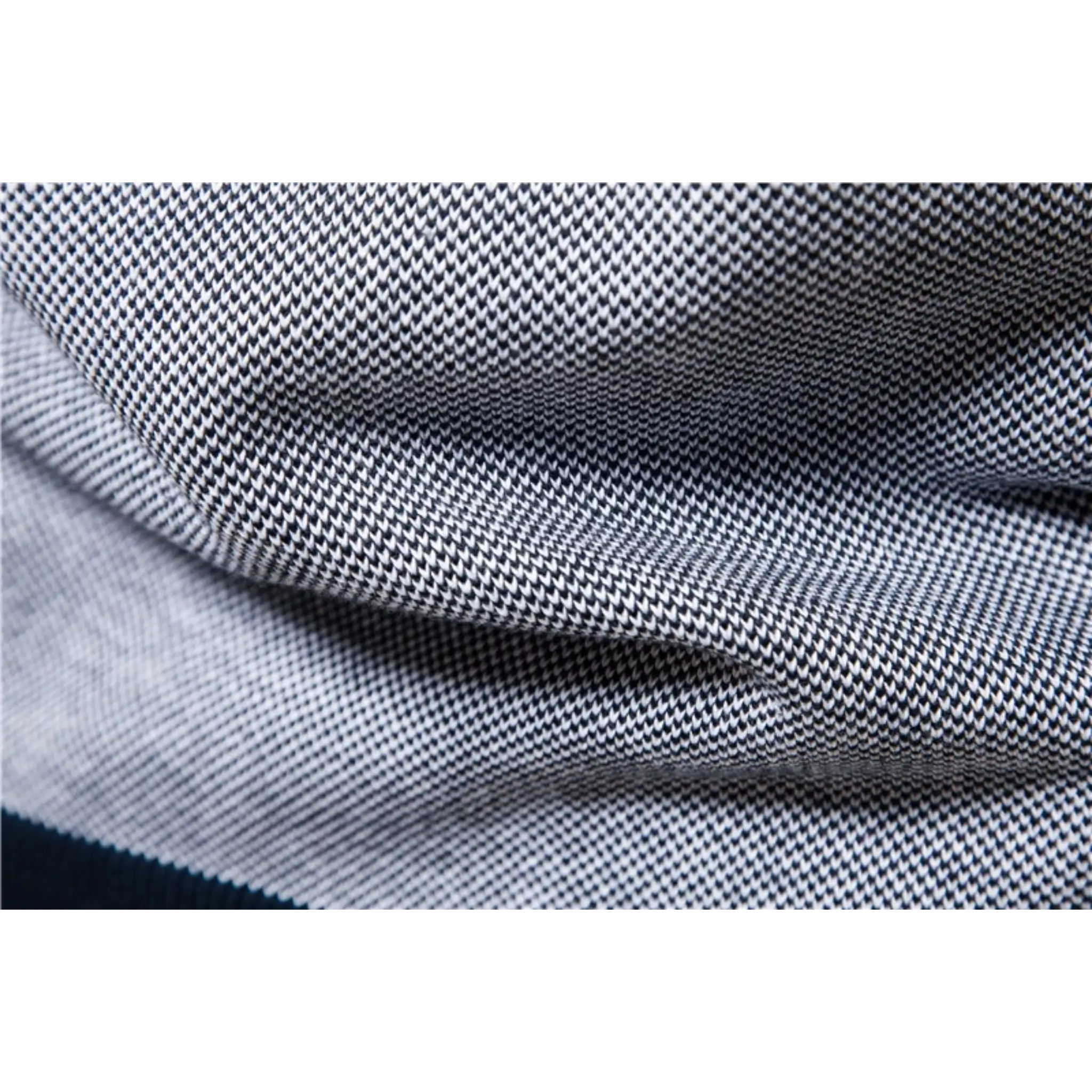 MannerCo navy raglan sleeve cardigan sweater fabric close-up showing fine knit texture and weave