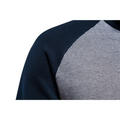 MannerCo navy raglan sleeve cardigan sweater detail showing contrast body and solid sleeve join