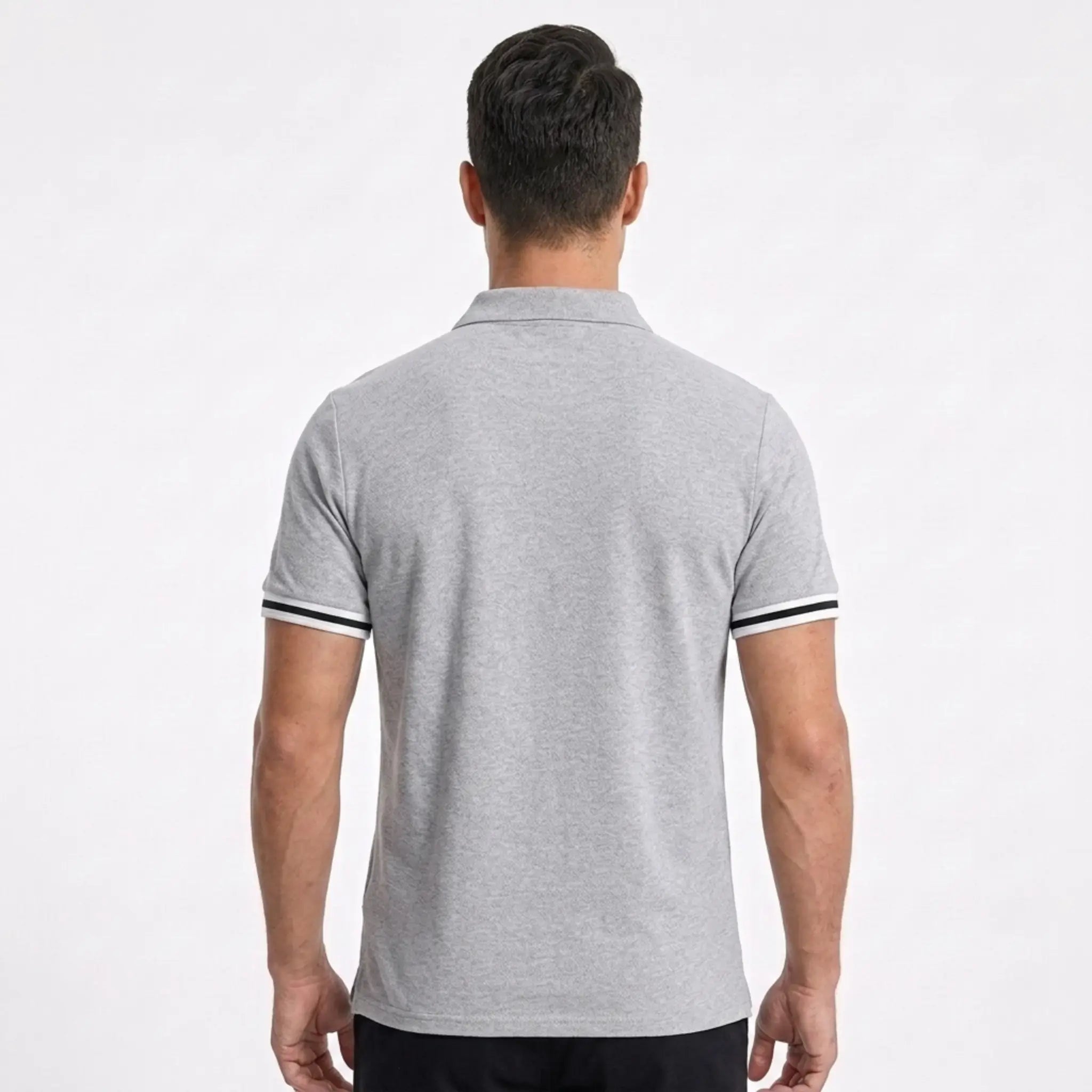 MannerCo light gray polo shirt back view with black and white striped sleeve cuffs