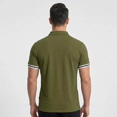 MannerCo military green polo shirt back view with white and black striped sleeve cuffs