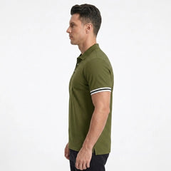 MannerCo military green polo shirt side view with black and white striped sleeve cuffs