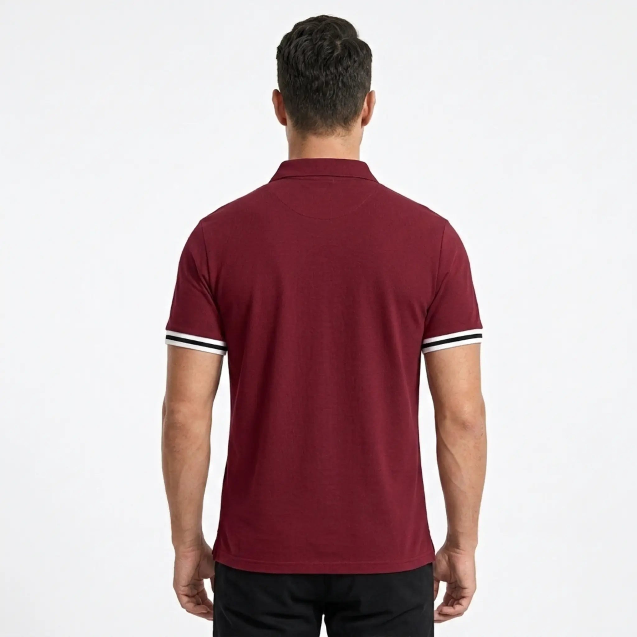 MannerCo wine red polo shirt back view with white and black striped sleeve cuffs