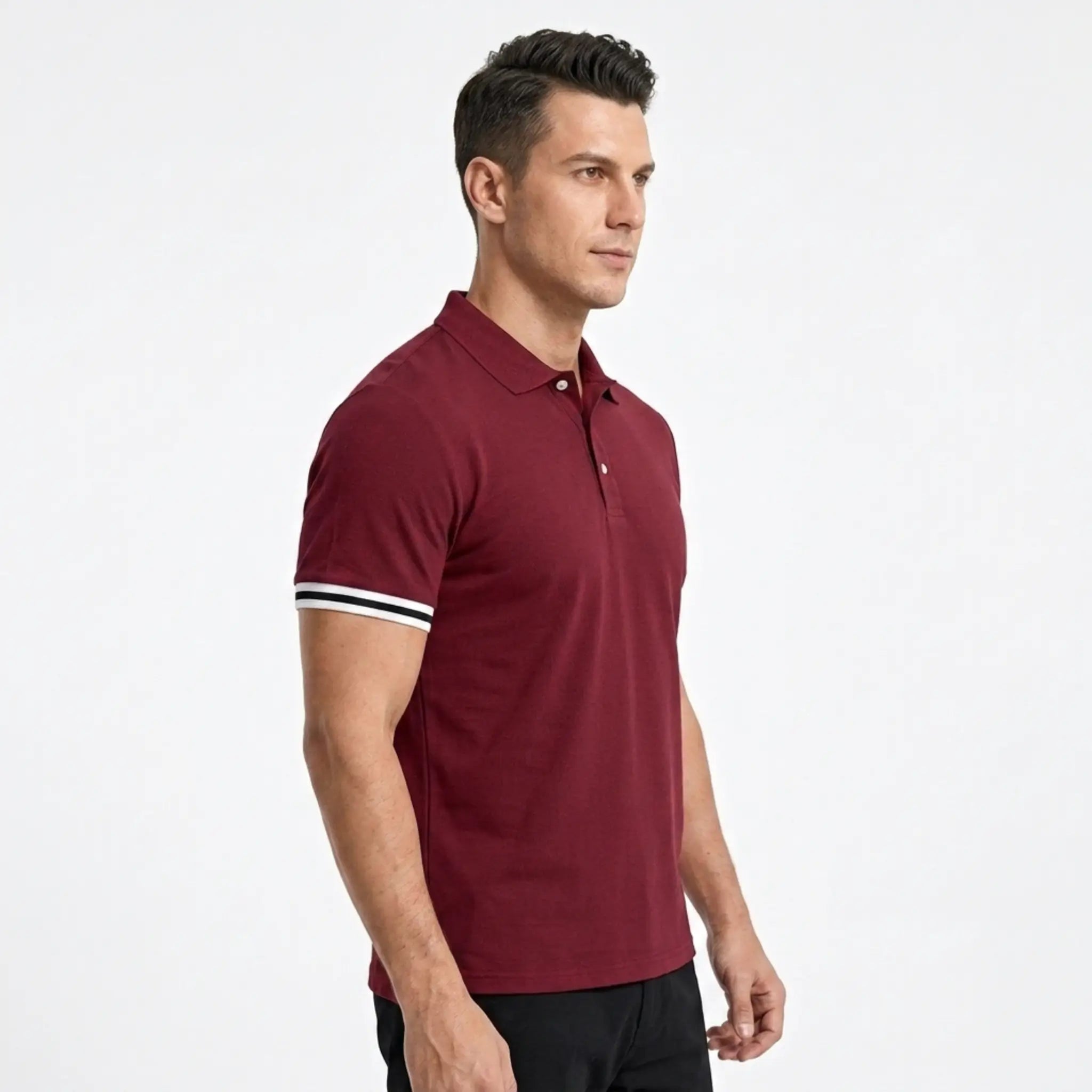 MannerCo wine red polo shirt with striped sleeve cuffs, side view on male model