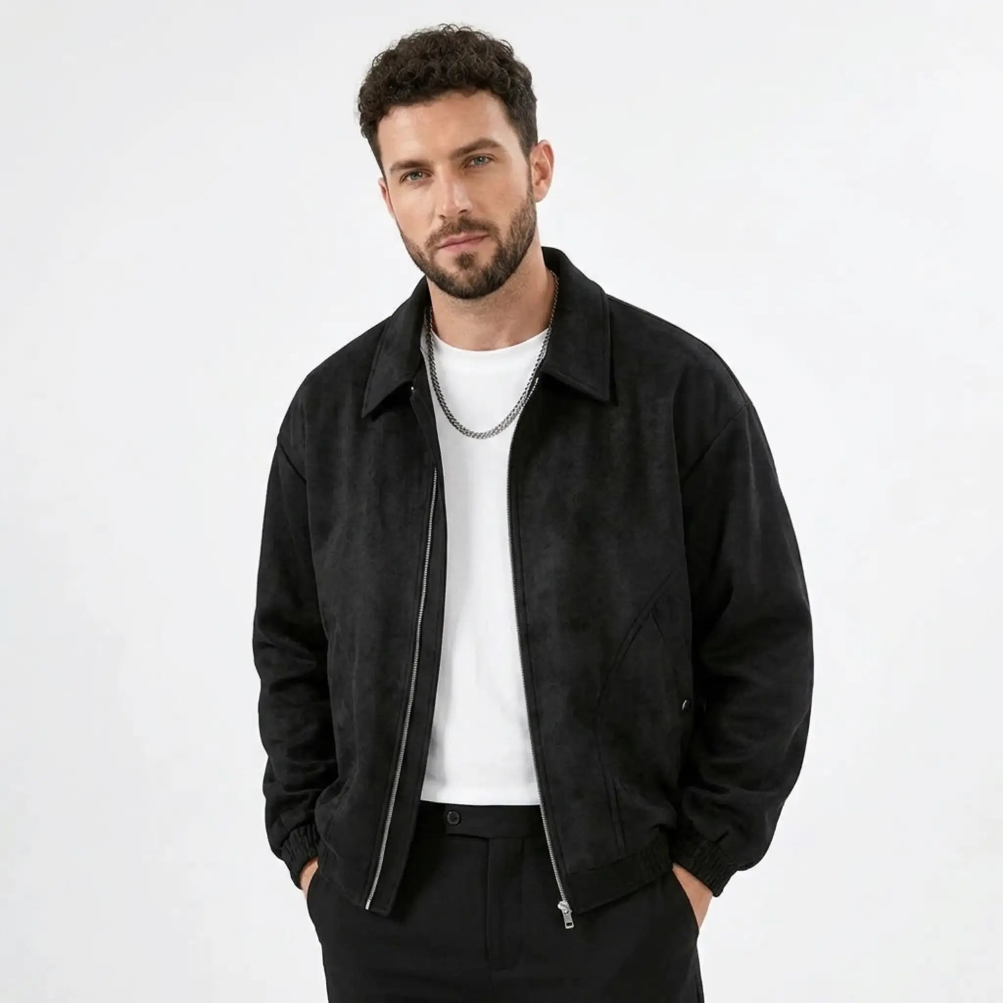 Man wearing MannerCo black PU leather retro lapel jacket in outdoor lifestyle setting