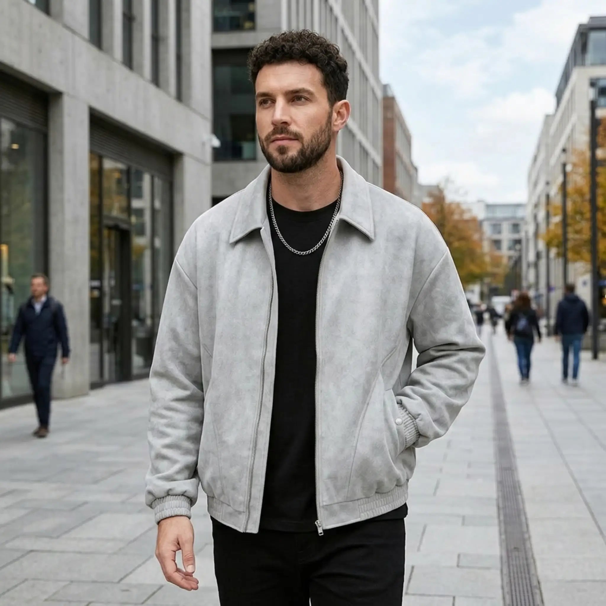 Man wearing MannerCo black PU leather retro lapel jacket, side view on plain background