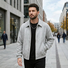 Man wearing MannerCo black PU leather retro lapel jacket, side view on plain background