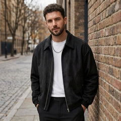 Man wearing MannerCo brown PU leather retro lapel jacket with loose fit, front view