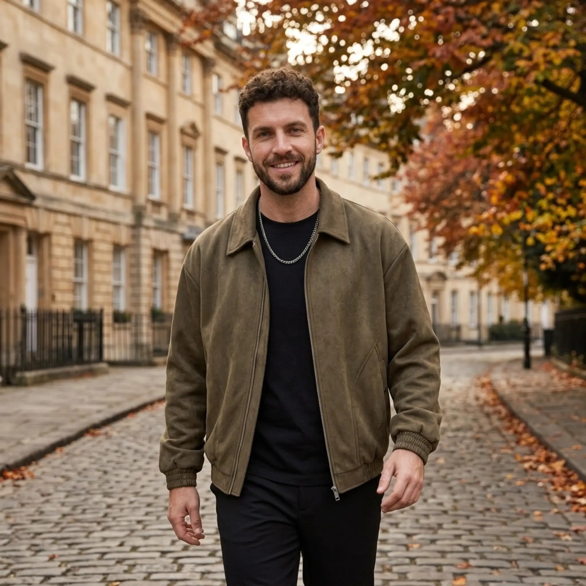 Man wearing MannerCo brown PU leather retro lapel jacket in outdoor lifestyle setting