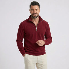 Man wearing MannerCo burgundy quarter zip mock neck sweater slim fit, front view on plain background