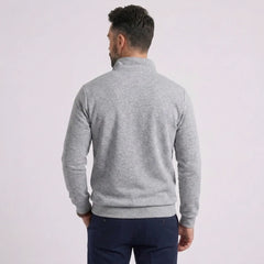 Man wearing MannerCo gray quarter zip mock neck sweater slim fit, back view on plain background