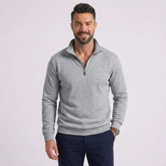 Man wearing MannerCo gray quarter zip mock neck sweater slim fit, front view on plain background