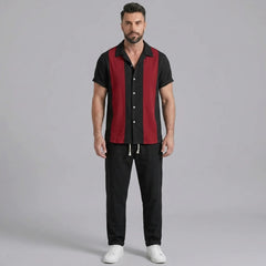 Man wearing a red patchwork cotton bowling shirt and straight leg linen pants front view on plain background
