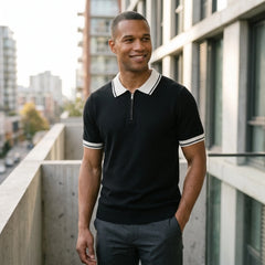 Man in royal blue color block knit polo shirt in sunny outdoor scene