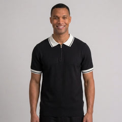 Side view of man in royal blue color block knit polo shirt with lapel collar
