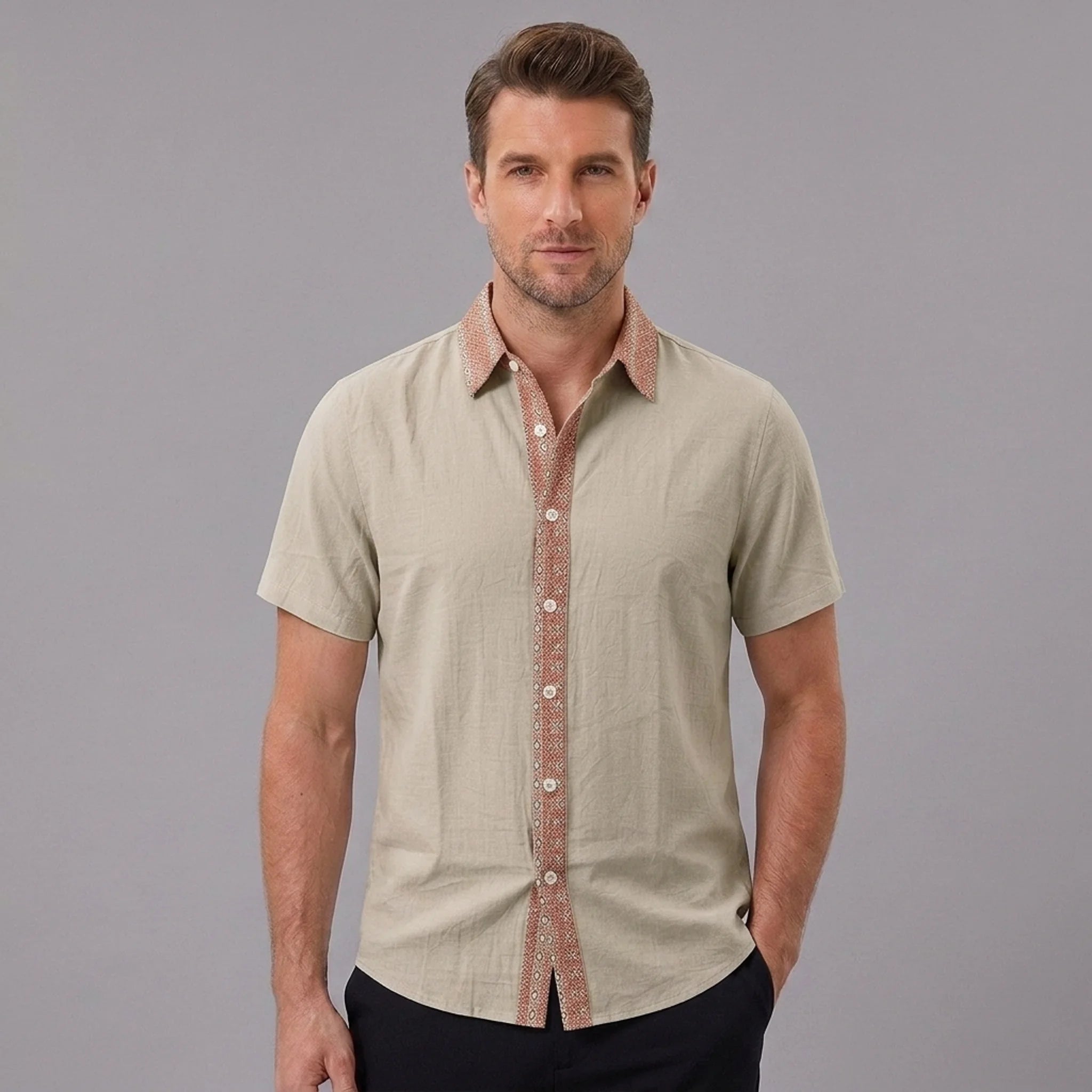 MannerCo sage green linen blend short sleeve shirt with contrast red pattern collar and button placket, front view