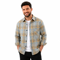MannerCo sky blue plaid flannel shirt worn by man long sleeve relaxed fit over white tee