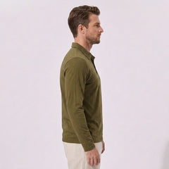 Back view of man wearing sky blue solid long sleeve cotton polo shirt