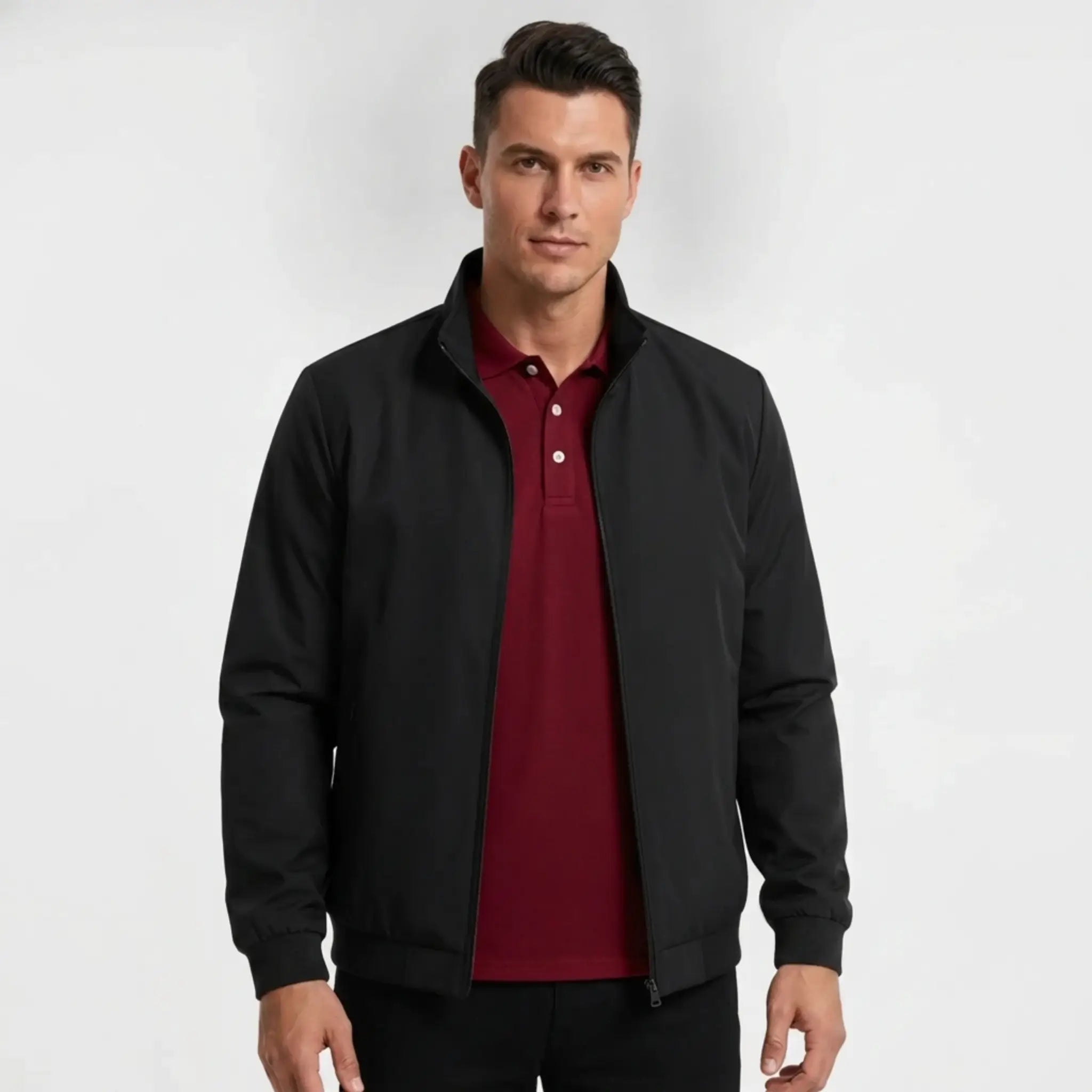 Man wearing MannerCo navy blue stand collar zip-up cardigan jacket in outdoor lifestyle setting