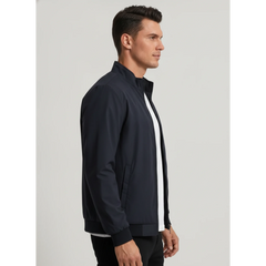 Man wearing MannerCo navy blue stand collar zip-up cardigan jacket, side view on plain background