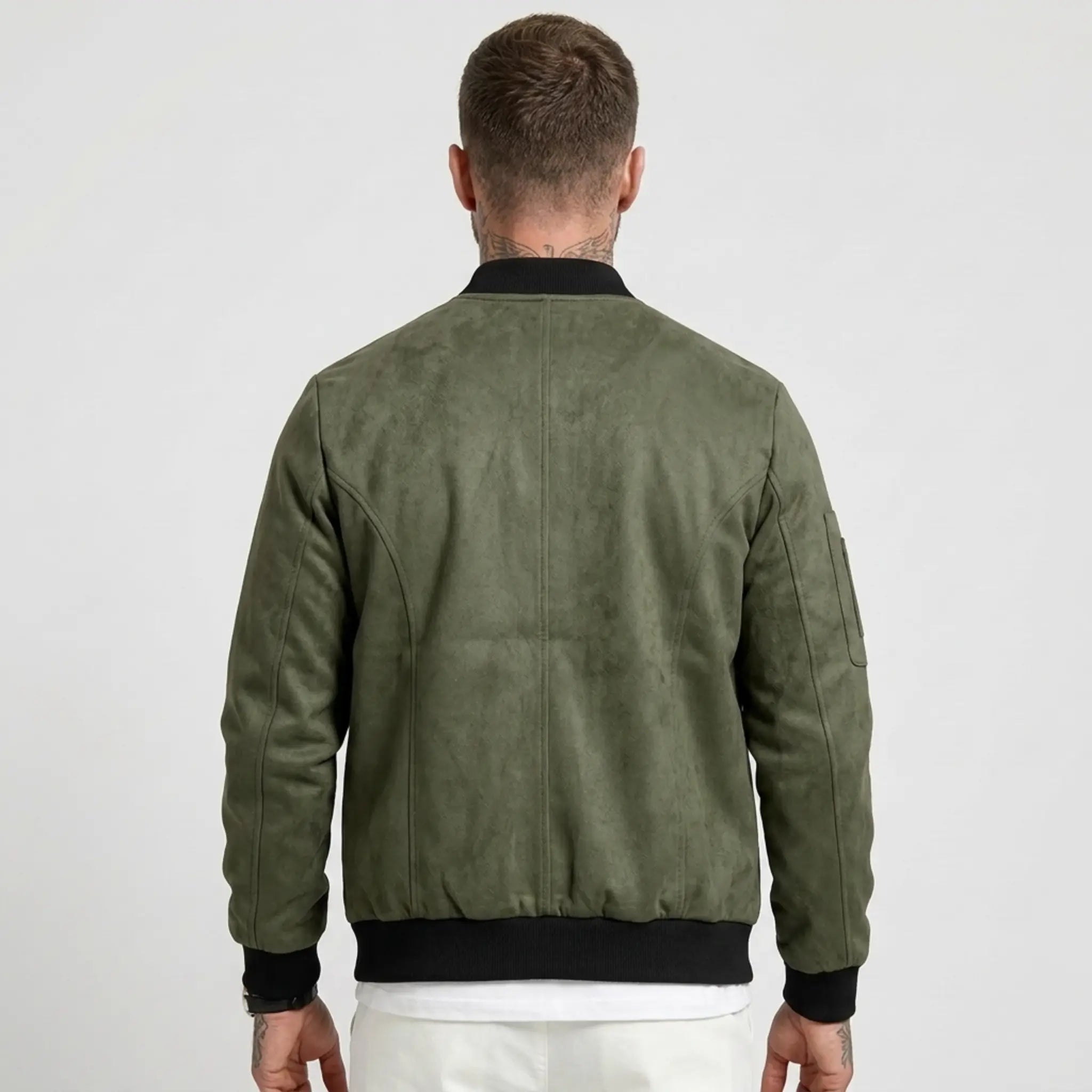 Man wearing MannerCo army green suede-blend stand collar jacket, back view on plain background