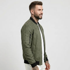 Man wearing MannerCo army green suede-blend stand collar jacket, side view on plain background