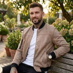 Man wearing MannerCo brown suede-blend stand collar jacket in outdoor lifestyle setting