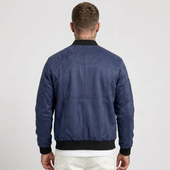 Man wearing MannerCo navy blue suede-blend stand collar jacket, back view on plain background